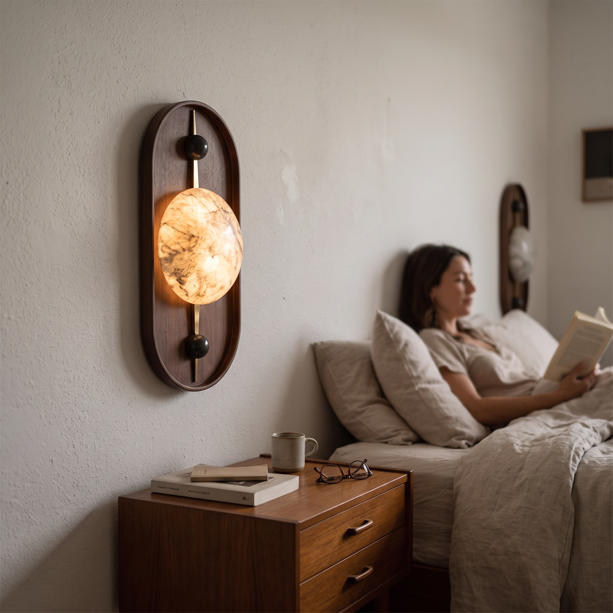 Alabaster Wall Light with Walnut in bedroom above bedside table - Driftwood