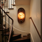 Alabaster Wall Light with Walnut on staircase wall - Driftwood