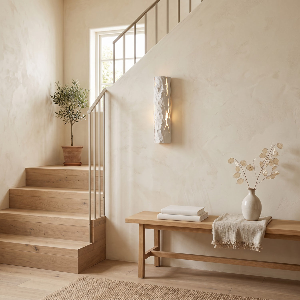 Bark Texture LED Wall Light – Model B in a staircase landing with limewashed walls