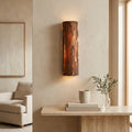Bark Texture LED Wall Light – Model A in a bright living room above a travertine console