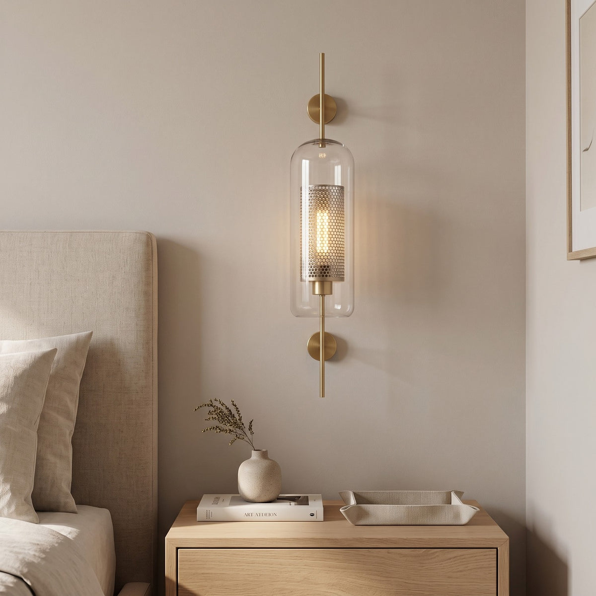 Clear Glass Wall Light – Brass / B in a serene bedroom beside an upholstered headboard and oak nightstand