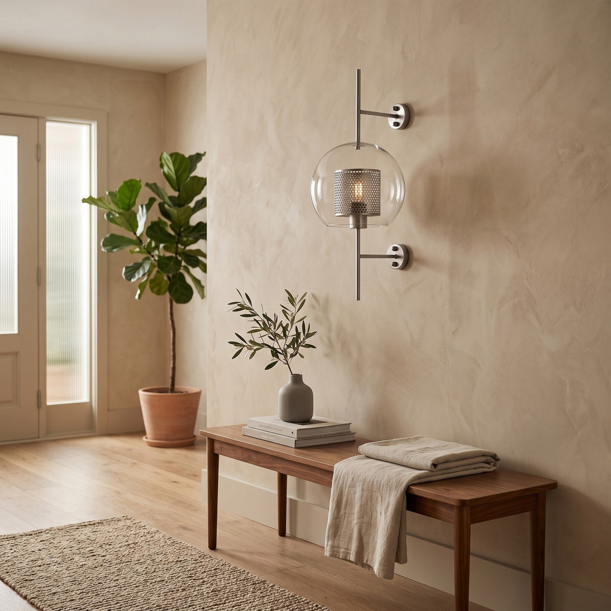Clear Glass Wall Light – Silver / A in an entrance hall above a slim walnut bench