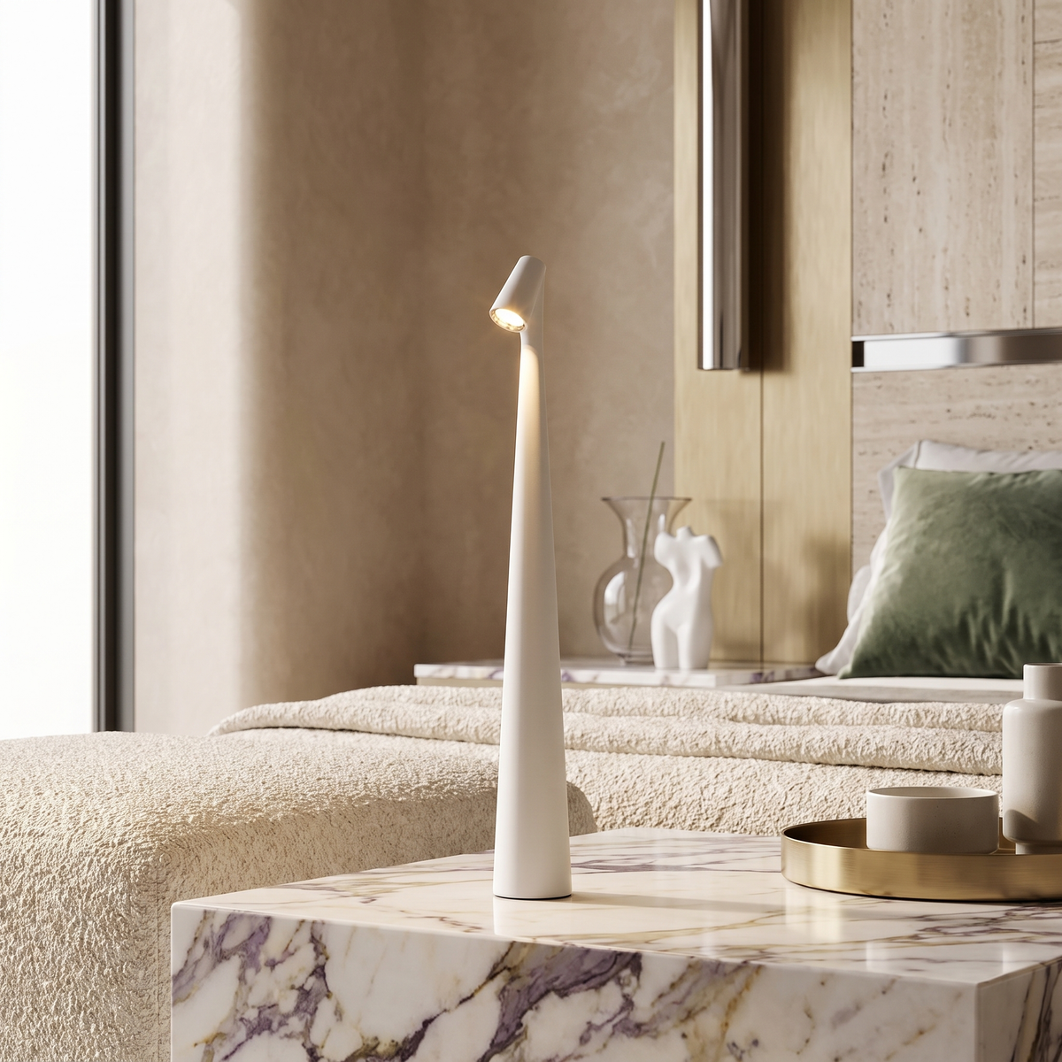 Slim white cordless LED table lamp with a minimalist 33cm design on a marble bedside table.
