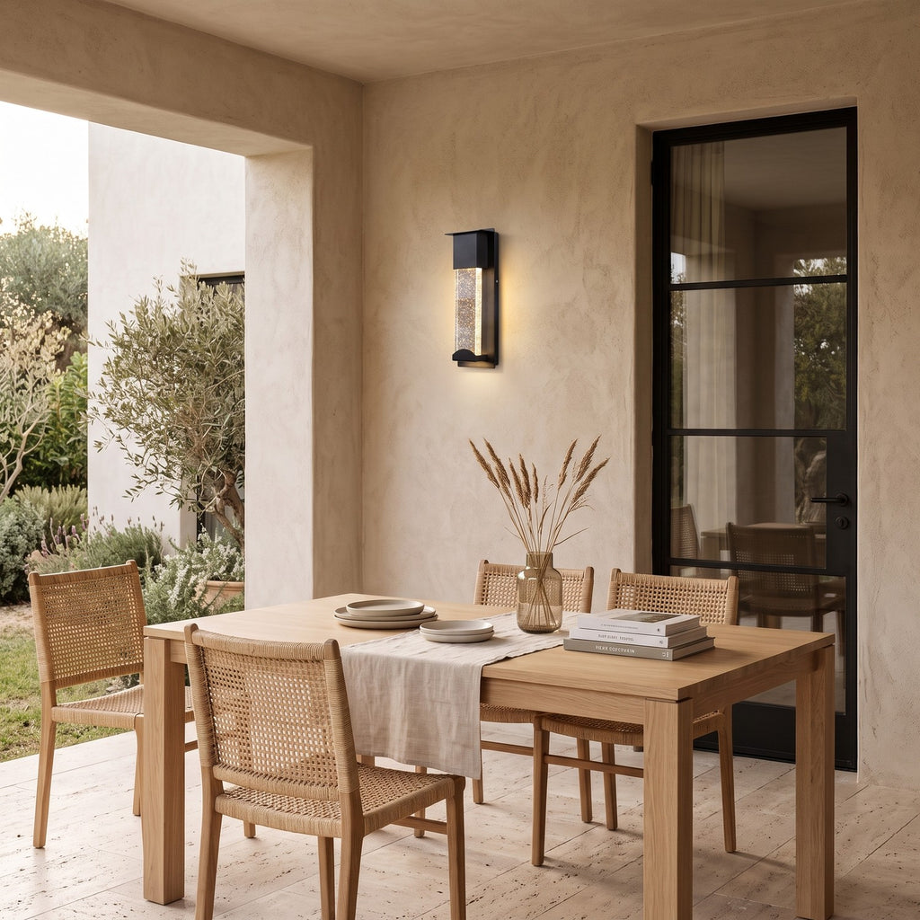 Crystal Effect Outdoor Wall Light – STEADY in a covered loggia with an outdoor dining table