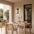 Crystal Effect Outdoor Wall Light – STEADY in a covered loggia with an outdoor dining table