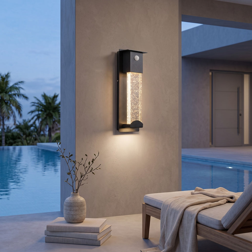 Crystal Effect Outdoor Wall Light – SENSOR in a poolside wall of a modern villa at blue hour