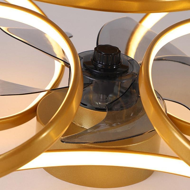 Modern gold flush mount ceiling fan with integrated LED light and translucent petal-shaped blades in a flower design.