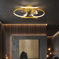 Modern gold flush mount ceiling fan with integrated LED light in a sculptural flower petal design.