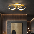 Modern gold flush mount ceiling fan with integrated LED light in a sculptural flower petal design.