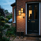 Outdoor Wall Light Black Glass beside front door at dusk - Ray