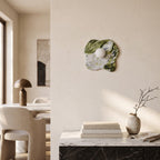 Green Marble Wall Light – Model C in an elegant dining room above a marble sideboard