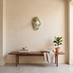 Green Marble Wall Light – Model A in an entrance hall above a slim walnut bench