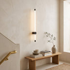 LED Tube Wall Light – Black-mid in a staircase landing with limewashed walls