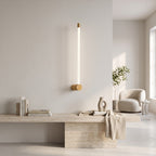 LED Tube Wall Light – Copper-end in a bright living room above a travertine console