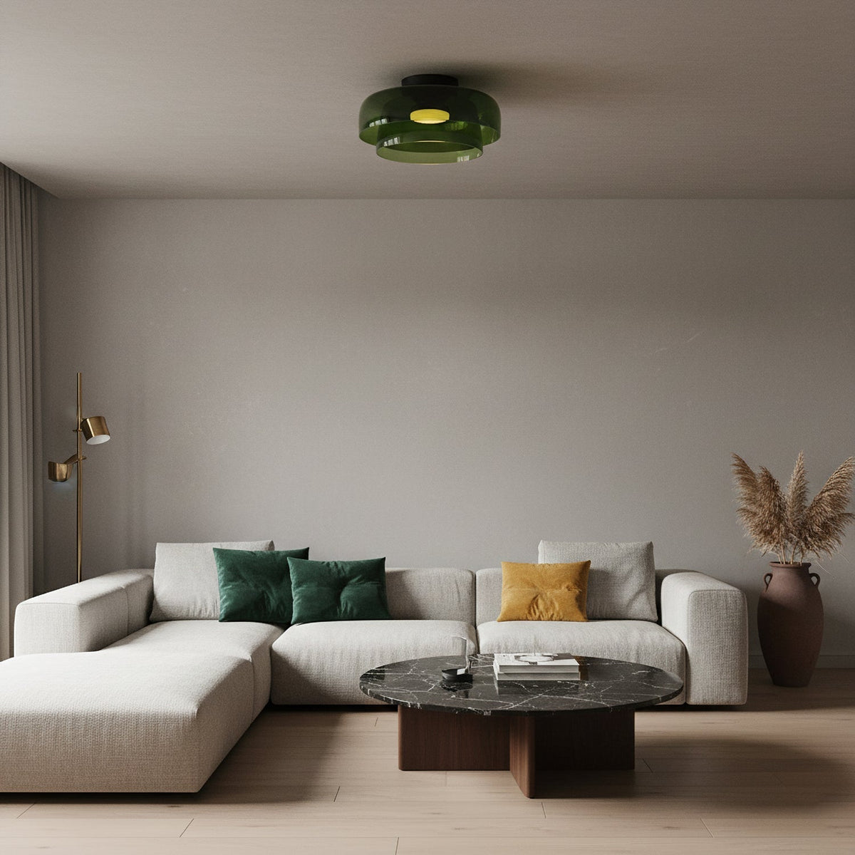Retro layered green glass ceiling light fixture mounted in a modern living room with a neutral sofa and marble coffee table.