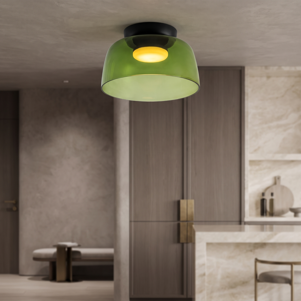 Retro green layered glass ceiling light with a warm glowing center, mounted in a modern kitchen interior.