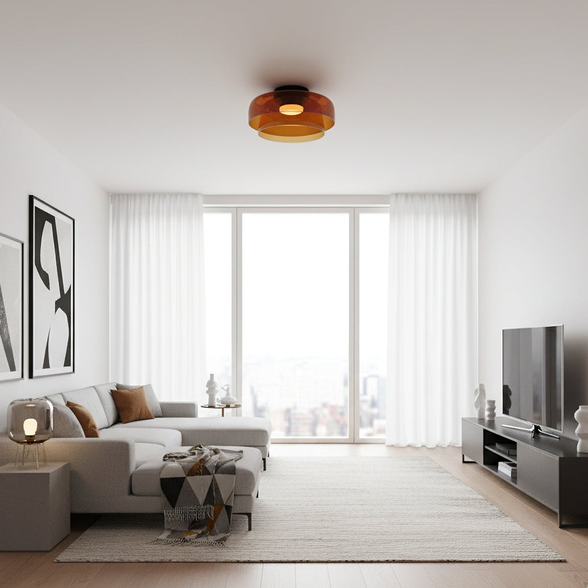 Retro layered orange glass ceiling light fixture illuminating a modern living room with a grey sectional sofa.