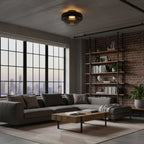 Retro layered smoky grey glass ceiling light in a modern living room with exposed brick and warm ambient lighting.