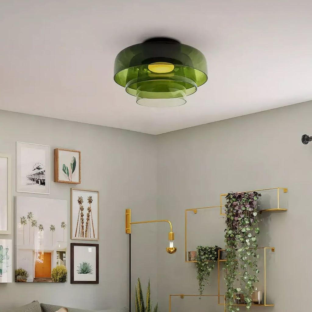 Retro layered green glass ceiling light with a stacked design mounted on a white ceiling.