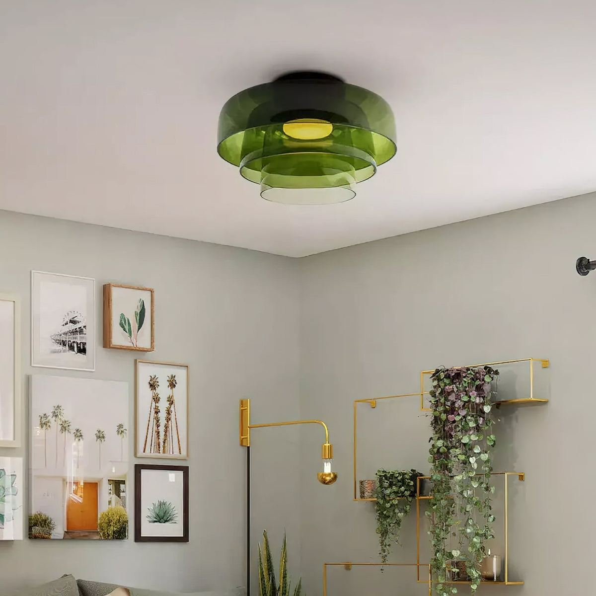 Retro layered green glass ceiling light with a stacked design mounted on a white ceiling.