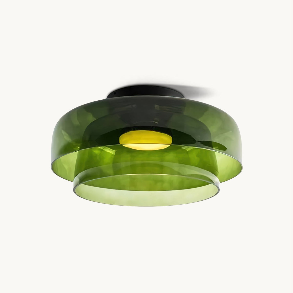 Retro layered green glass ceiling light with stacked tiers and a warm glowing center on a white background.