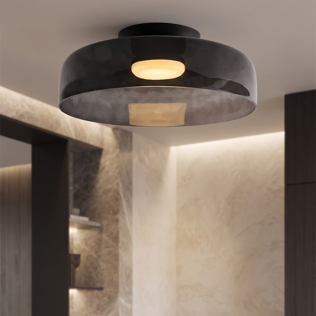 Retro layered ceiling light in smoky grey glass with a warm, glowing center, mounted on a modern interior ceiling.