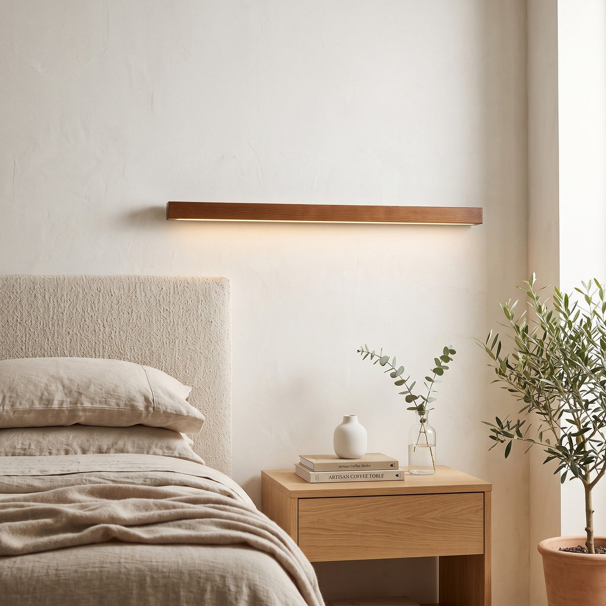 Linear Wood LED Wall Light – Brown in a serene bedroom beside an upholstered headboard and oak nightstand