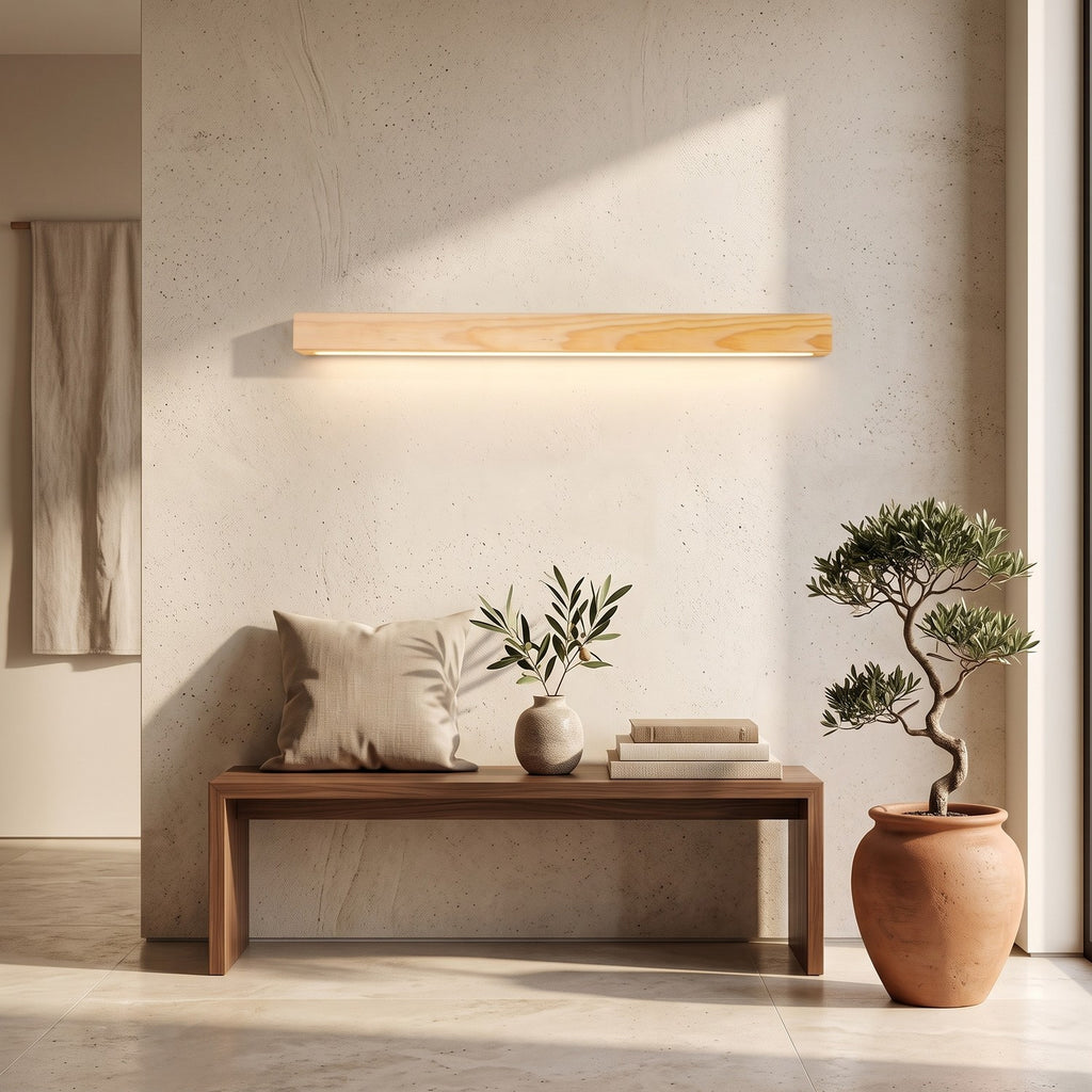 Linear Wood LED Wall Light – Wood in an entrance hall above a slim walnut bench