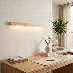Linear Wood LED Wall Light – Wood in a calm home office above a solid oak desk