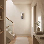 Marble Cylinder Wall Light – H 24cm in a staircase landing with limewashed walls