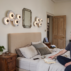 Alabaster Style Wall Light Multi Disc pair styled in interior - Cryn