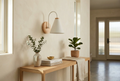 Nordic Wood Wall Light in white above a console table in an entrance hall