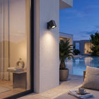 Outdoor Spotlight Wall Light – in a poolside wall of a modern villa at blue hour