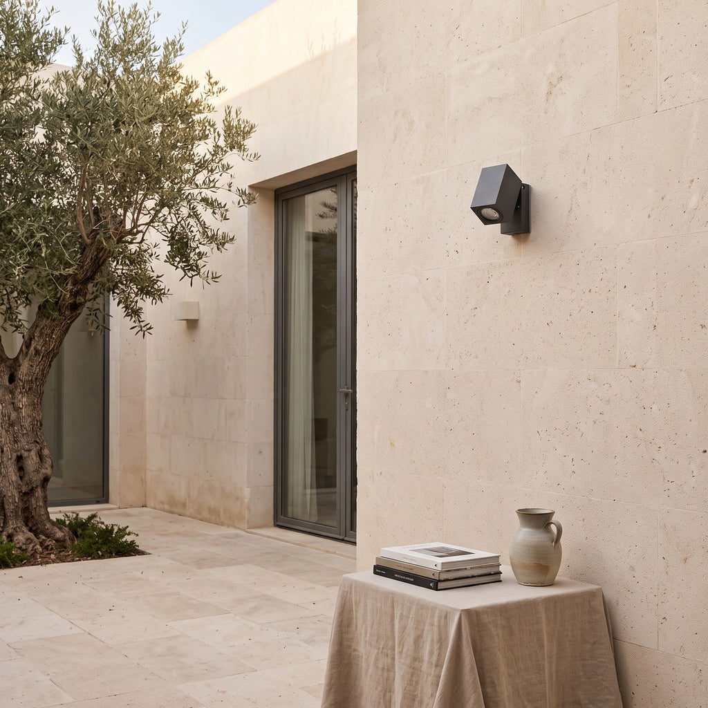 Outdoor Spotlight Wall Light – in a courtyard with olive trees and limestone walls