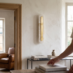 Oval Alabaster Style Wall Light with Brass detail in daylight - Kristy