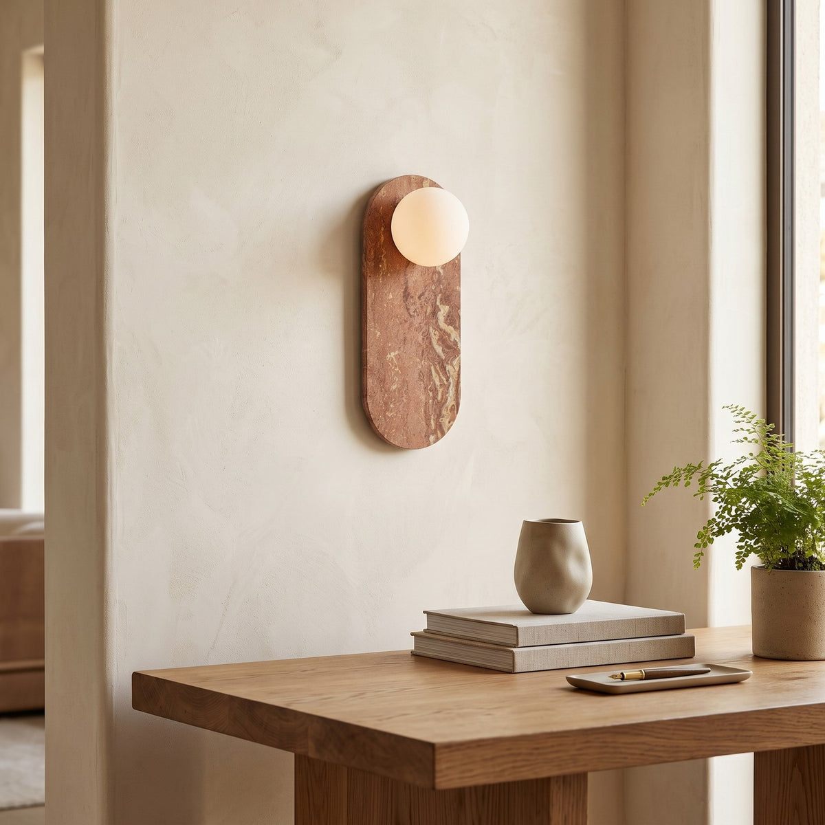 Oval Marble Wall Light – Red Brown in a calm home office above a solid oak desk