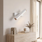 Rotatable LED Wall Light – White in a bright living room above a travertine console