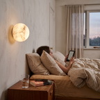 Round Alabaster Wall Light in bedroom above bedside table - Kristy