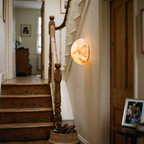 Round Alabaster Wall Light on staircase wall - Kristy