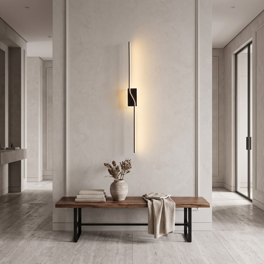 Slim Linear LED Wall Light – Black in an entrance hall above a slim walnut bench
