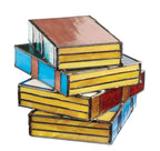 Vintage stained glass table lamp shaped like a stack of colorful books with yellow, blue, and red textured glass panels.