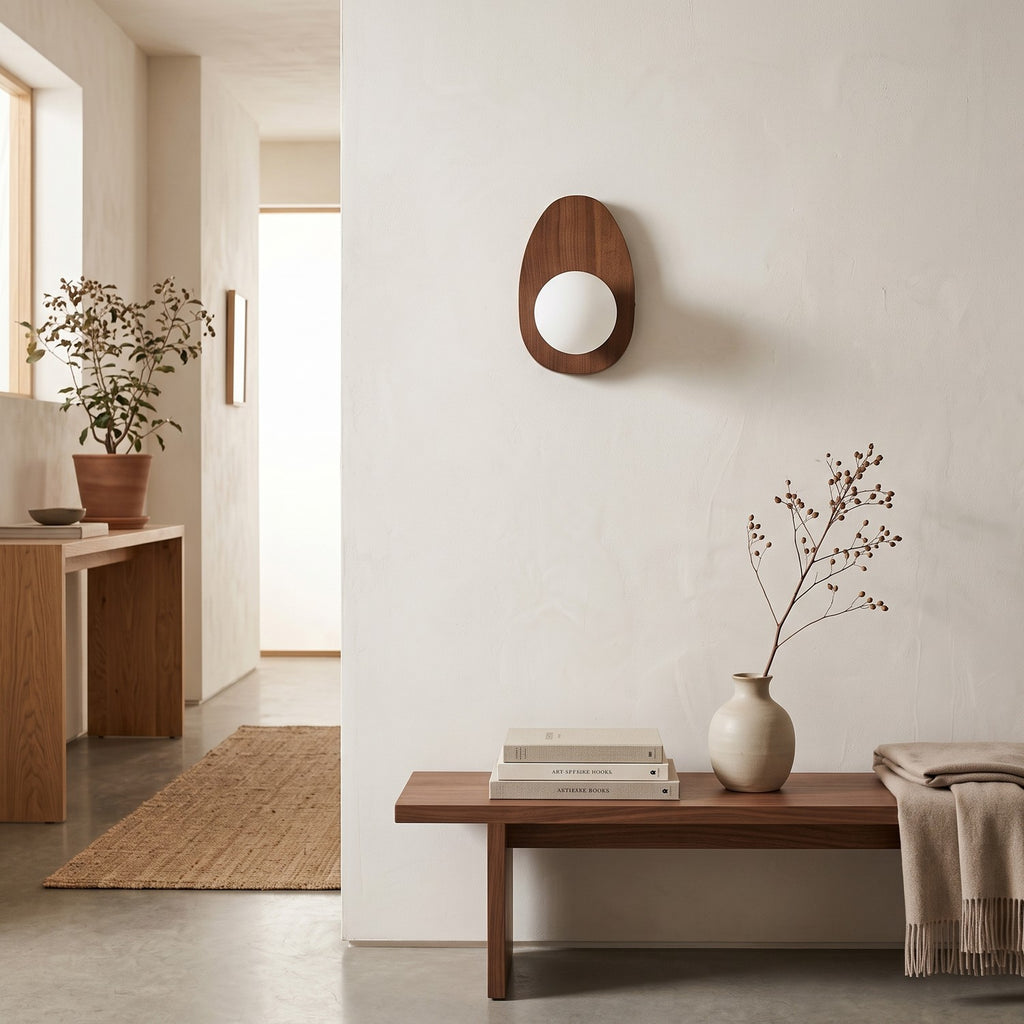 Walnut Wood Wall Light in an entrance hall above a slim walnut bench