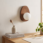 Walnut Wood Wall Light in a calm home office above a solid oak desk