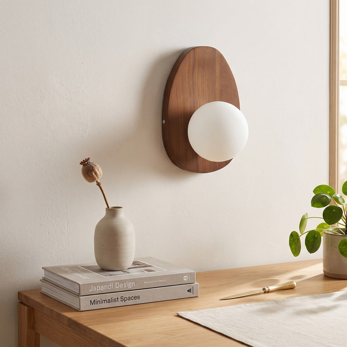 Walnut Wood Wall Light in a calm home office above a solid oak desk